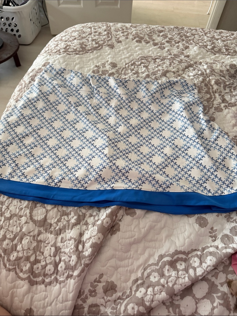 Champion White Mini Skirt with Light Blue Geometric Pattern and Blue Hem